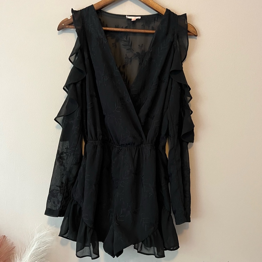 Black frilly thinker with cutout sleeves